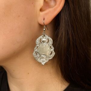 Cherub Dangle Earrings Silvertone 1.75” long pierced